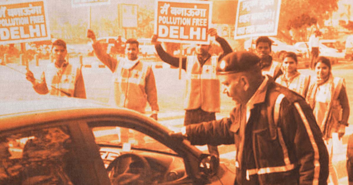 Protesters with signs for pollution free Delhi
